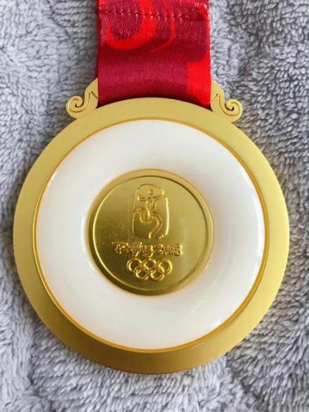 奥运奖牌是纯金的吗，奥运奖牌是纯金的吗为什么